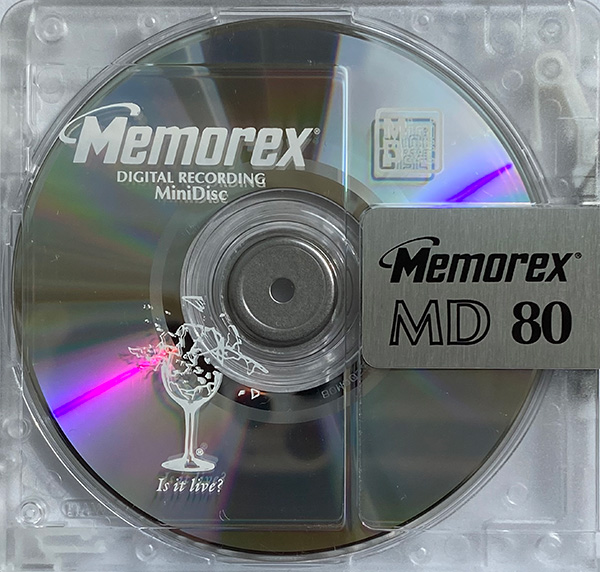 Image of a clear 80 minute Memorex minidisc