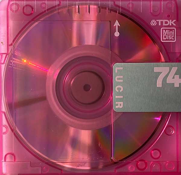 Image of a 74 minute pink TDK Lucir minidisc