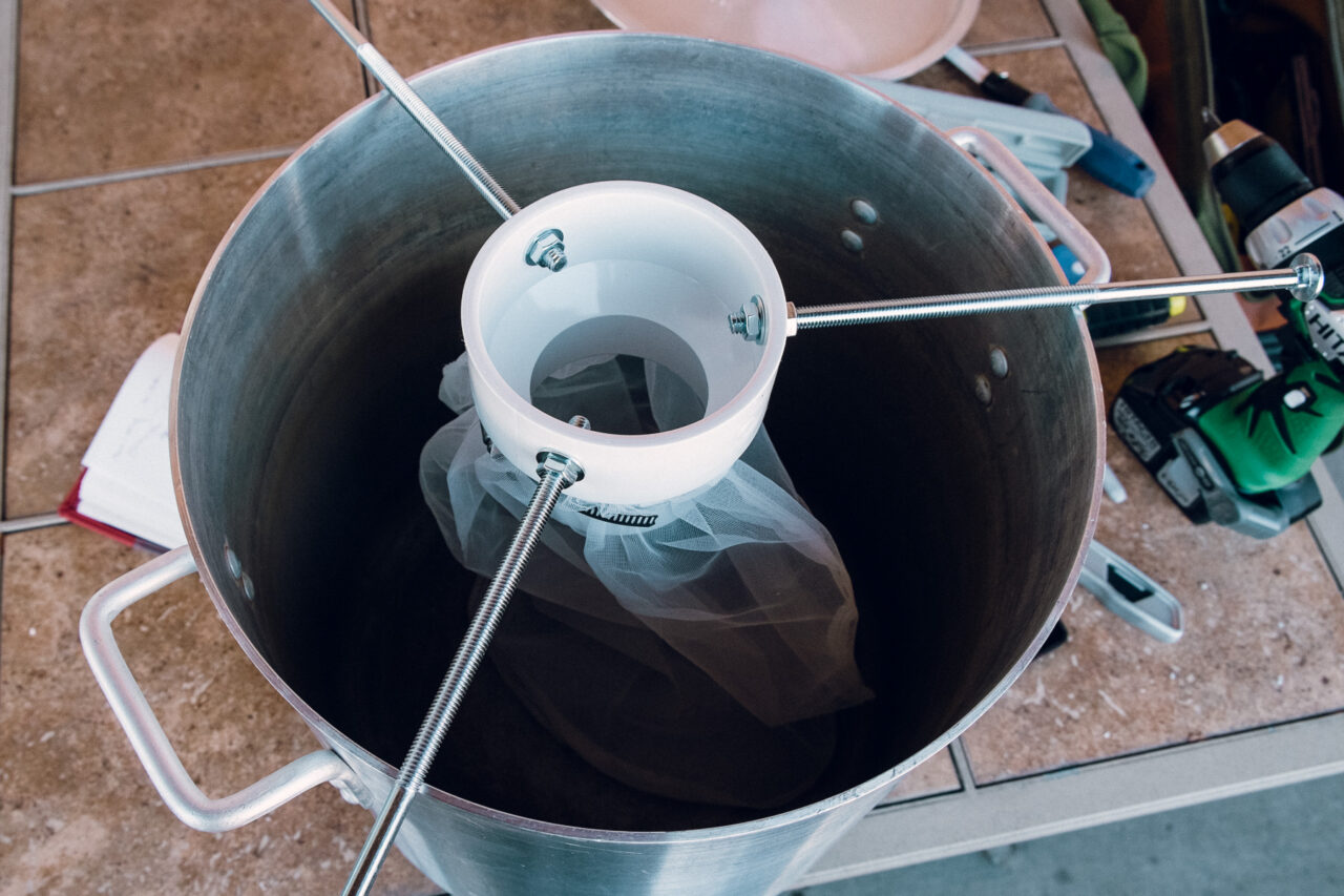 Hop spider in brew kettle